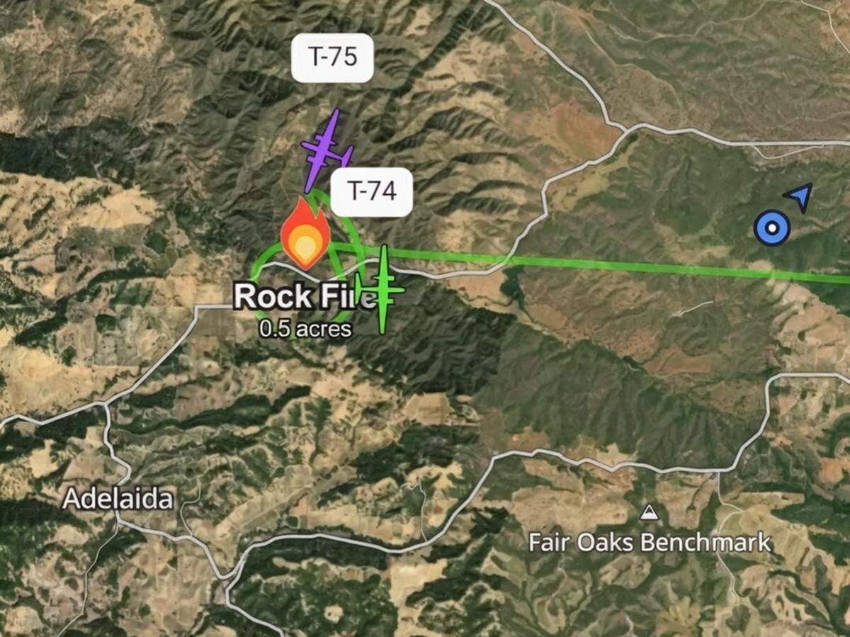 Aircraft and firefighting resources respond to the Rock Fire west of Paso Robles on Sunday, May 10, 2026, according to a Watch Duty map.