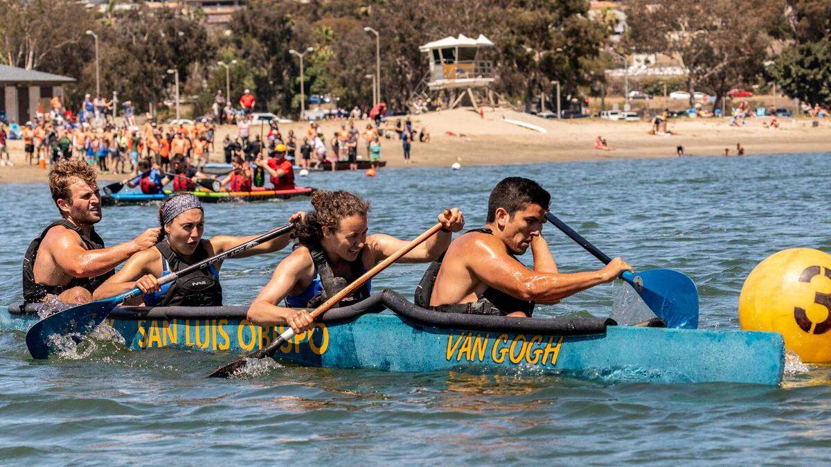Cal Poly's coed sprint paddlers, from left, Derek Fromm of Seattle, Eleni Korogianos of Long Beach, Hailey Bond of Costa Mesa and Mason Breipohl of Elk Grove approach a buoy during races held Monday in Mission Bay's DeAnza Cove. The students won the race in 2:46.92 and finished more than 12 seconds ahead of second-place University of Florida.