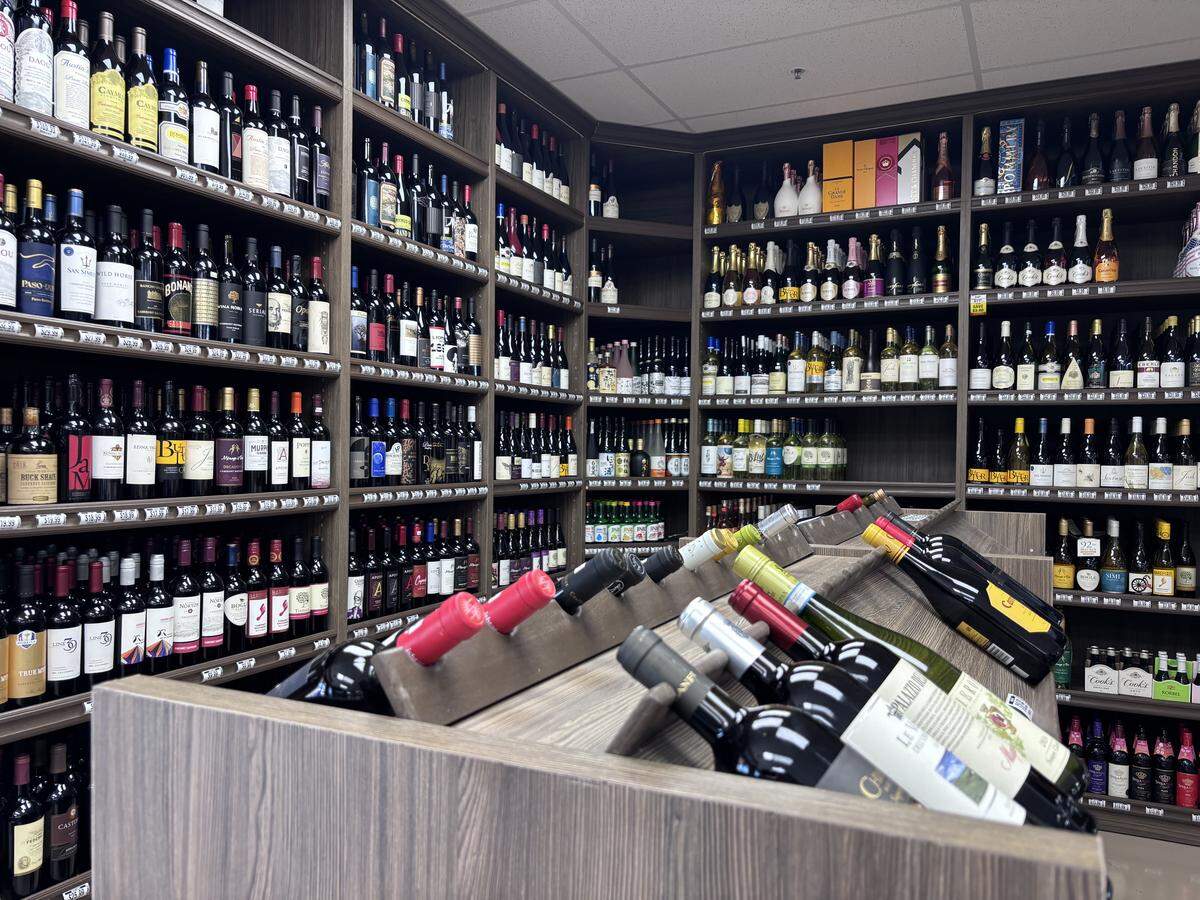 Local wines, imported wines and chilled wines in a fridge at Morro Liquor in Atascadero, seen here on March 18, 2026.