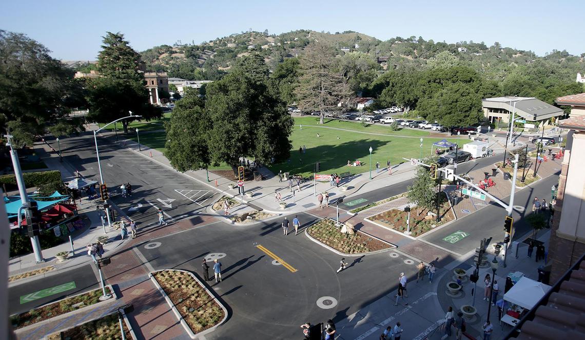 People enjoy a block party after a ribbon-cutting ceremony held Friday, June 27, 2025. Atascadero, California, completed its downtown makeover on El Camino Real with new parking, lights and greenery.