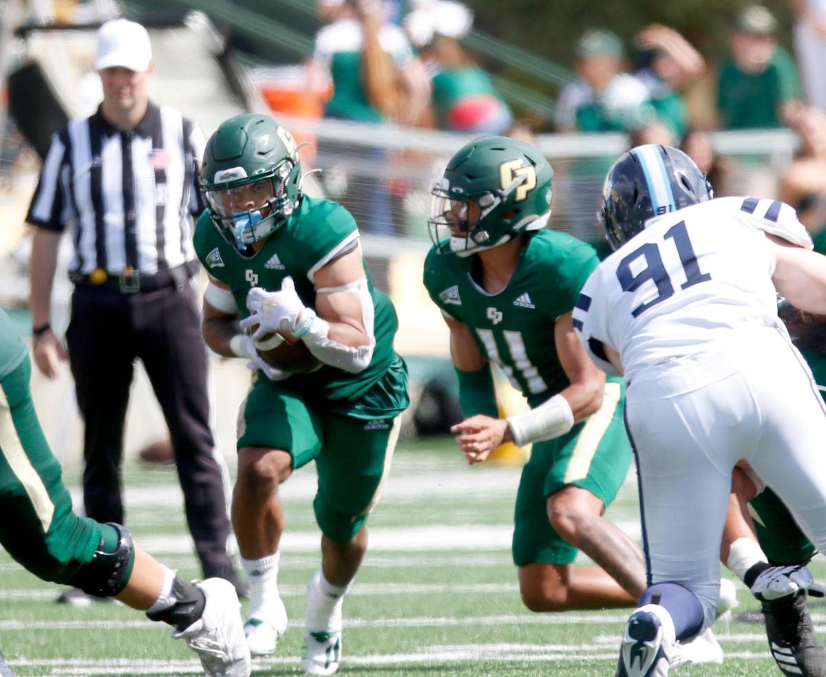 Cal Poly quarterback Jaden Jones (11) passes the ball to Shakobe Harper (8) in the Mustangs’ 28-27 comeback win against the University of San Diego at Alex G. Spanos Stadium in San Luis Obispo on Saturday, Sept. 10, 2022.