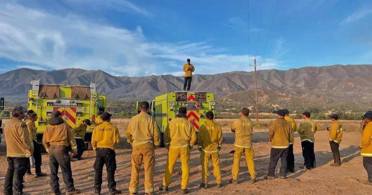 A strike team made up of firefighters from the Sacramento area on the Central Coast for the Gifford Fire paused to spruce up a memorial for the four men killed in the 1979 Spanish Ranch Fire in the same area.