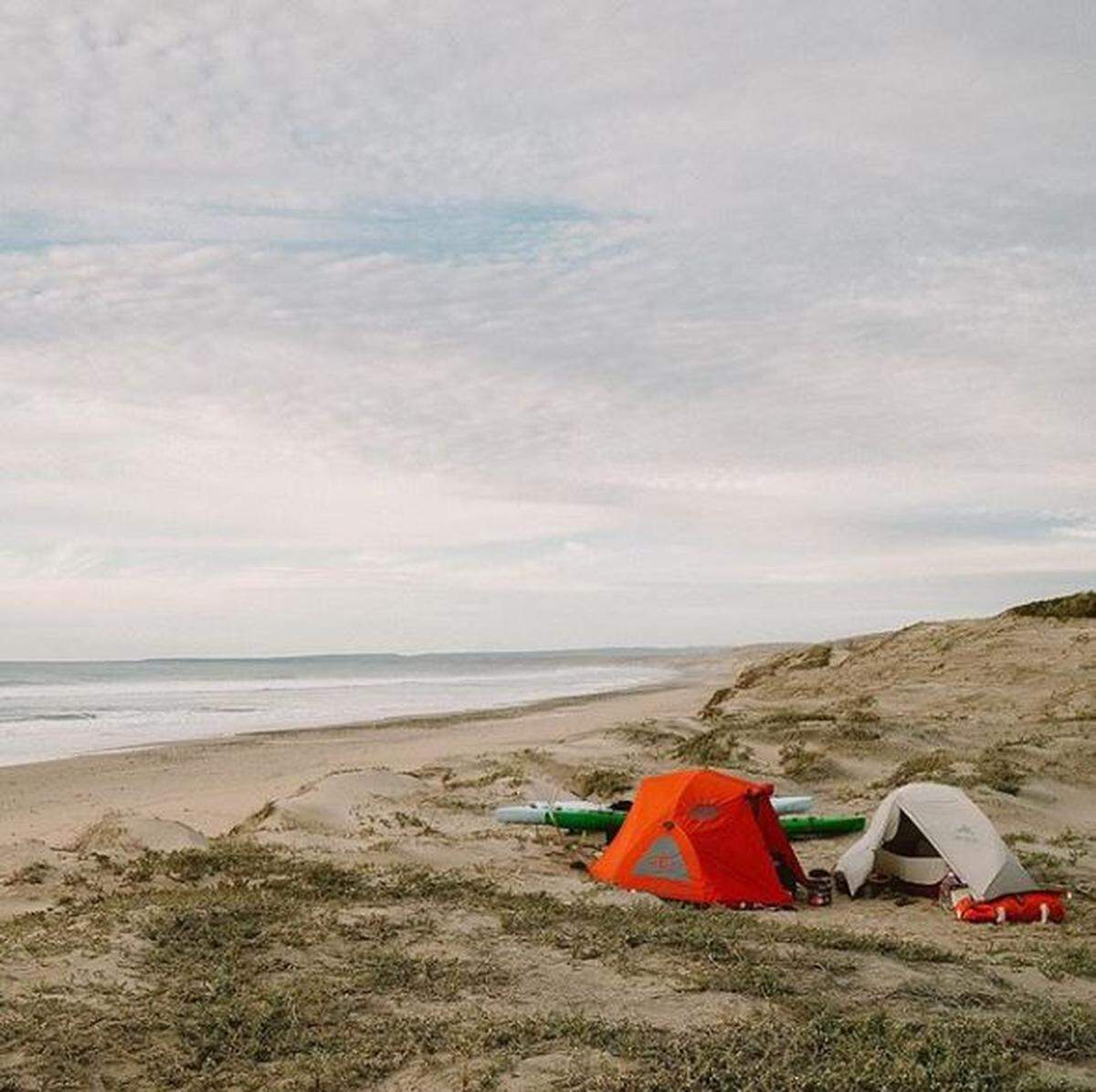 Ryan and Casey Higginbotham of Pismo Beach make camp on the Baja Peninsula during their 1,100-mile paddleboard journey from the U.S. border to Cabo San Lucas.