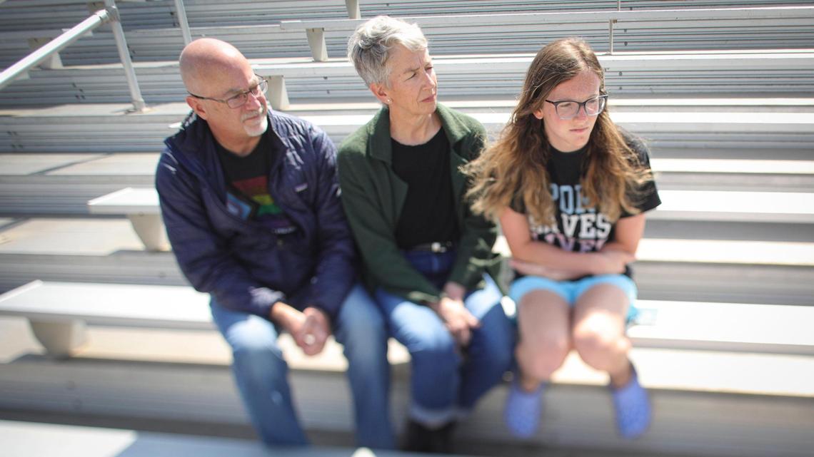From left, parents Trevor and Hilary and their transgender daughter Lily at Arroyo Grande High School, where they discussed Lily’s experience participating on the girls track team.