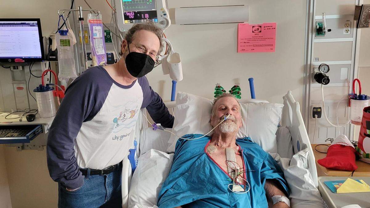 Steve Ulrich, (right) recovers in Providence St. Vincent Medical Center from a heart transplant surgery with “Rubes” author and Nipomo resident Leigh Rubin (left) Dec. 8, 2022. Rubin acted as his lifelong friend’s caretaker through his three-month recovery process.
