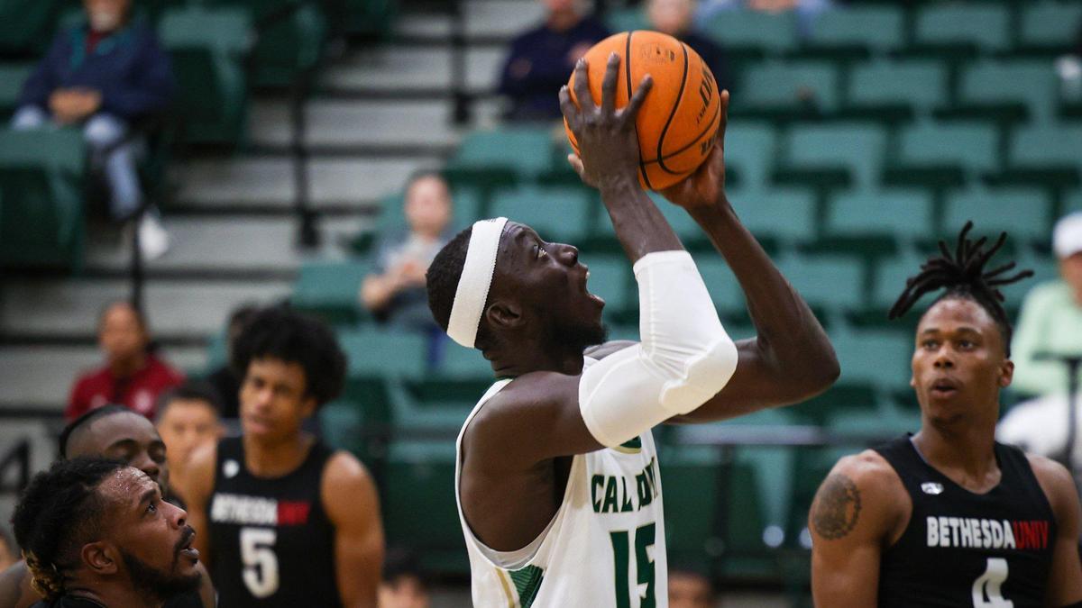 Ali Koroma lines up a shot as Cal Poly basketball opened its season with a 94-59 win against Bethesda University on Nov. 7, 2022.