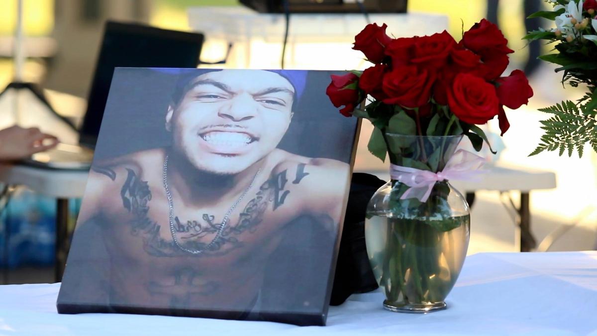Hundreds gathered at a community vigil for Trevon Perry held in Downtown City Park after police found his remains and arrested a suspect accused of killing him.