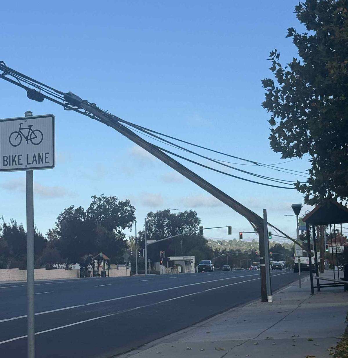 Utility poles and lines were toppled and scattered in the street on El Camino Real in Atascadero on Oct. 27, 2025, closing down the city’s main drag to traffic.