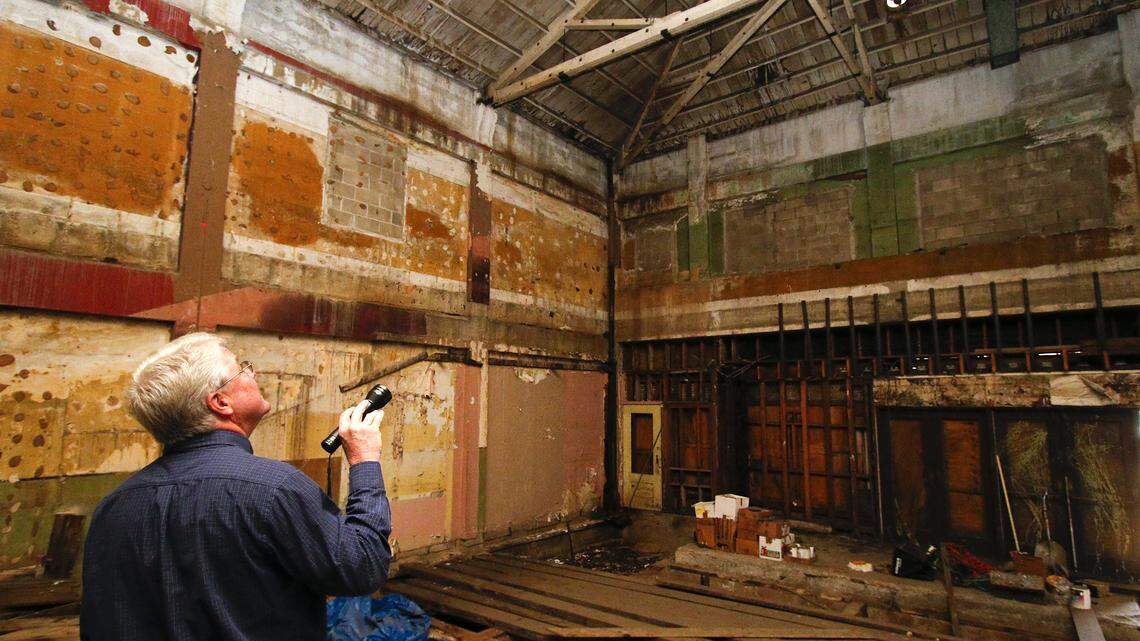 Real estate broker Keith Gilliss looks over the gutted interior of the Fox Theatre.