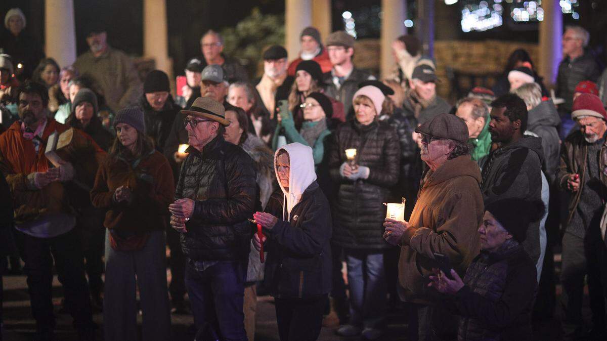 About 200 people gathered in Mission Plaza on Jan. 8, 2026 to protest recent detentions or arrests of 1,400 people by ICE and nationally the recent shootings by federal agencies. 