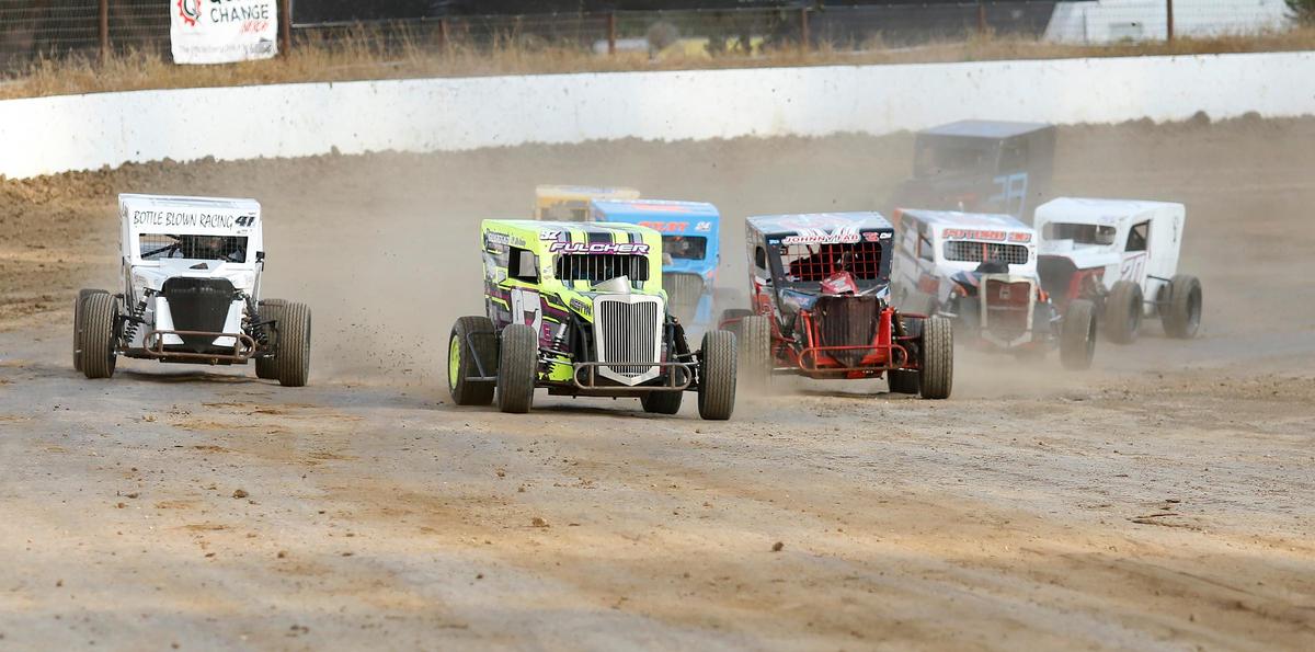 Dwarf cars race on the new dirt track at the Santa Maria Speedway on May 17, 2025. The speedway recently reopened under new owners.