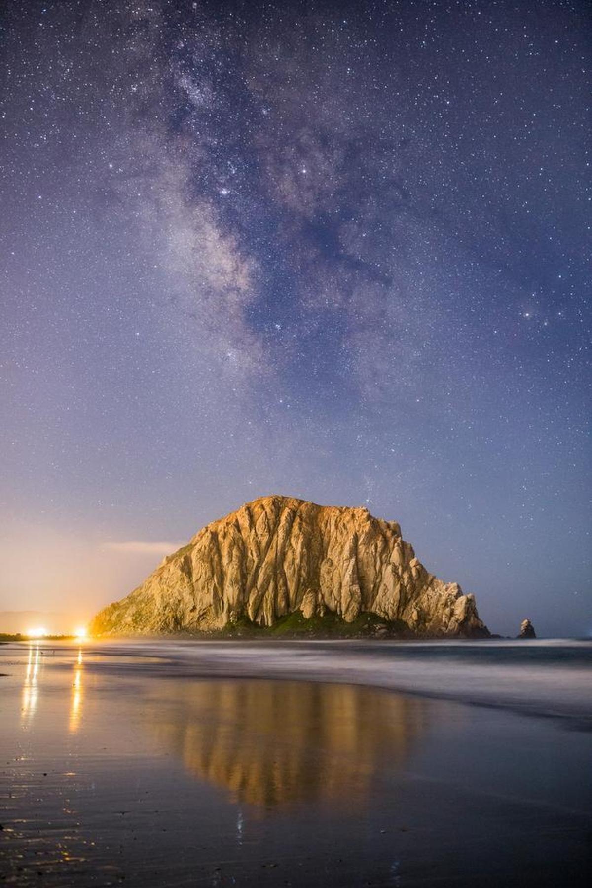 Central Coast photographer Brady Cabe captures a view of the Milky Way on the beach near Morro Rock.