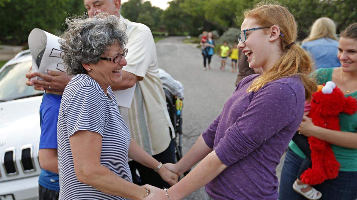 Kate Kendrick, 12, right, shares a laugh with Joan Tober after the Kendrick family arrives in Frisco, Texas, during a 2016 road trip. Traveling with family members can be fun if you follow a few simple guidelines, San Luis Obispo therapist Linda Lewis Griffith says.