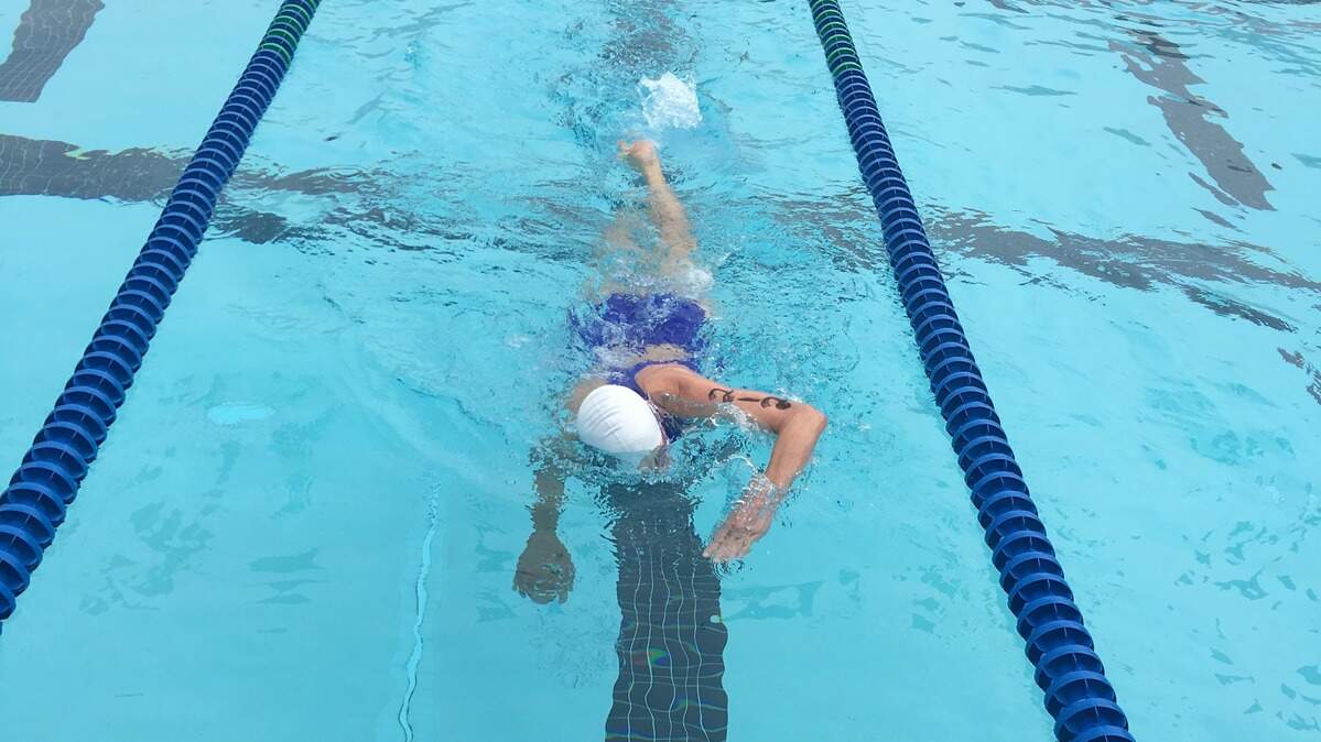 Retired therapist Linda Lewis Griffith competes in the 40th annual San Luis Obispo Triathlon in 2019. Should she resume swimming at SLO Swim Center?
