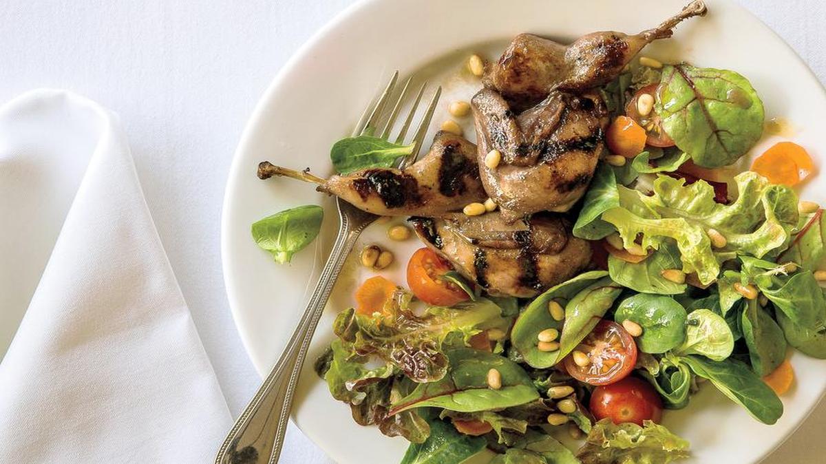 Grilled quail salad is drizzeld with honey-mustard vinaigrette at The Ranch House in Ojai.