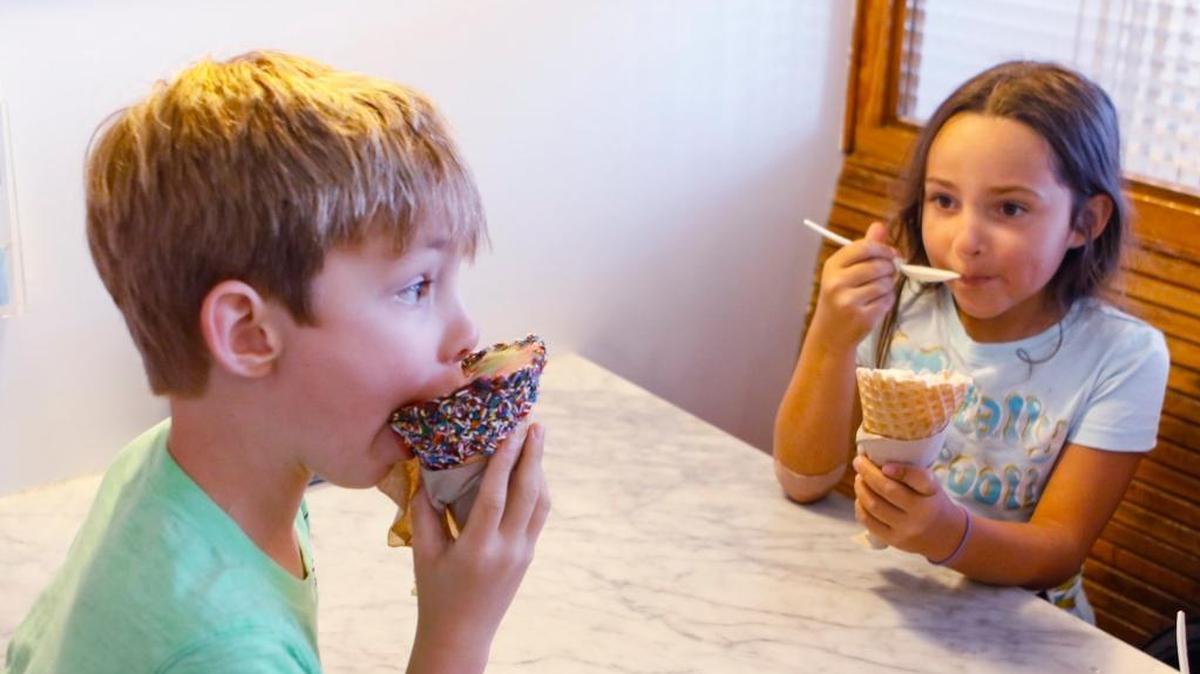 Jackson Baker, 6, tackles a cone of Straight to the Dentist ice cream, while Gwen Cooper, 8, has a combination of Caramel X-plosion and Birthday Cake ice cream at Doc Burnstein’s Ice Cream Lab in Arroyo Grande in 2016. The ice cream shop is opening its third location in Santa Maria later this month.