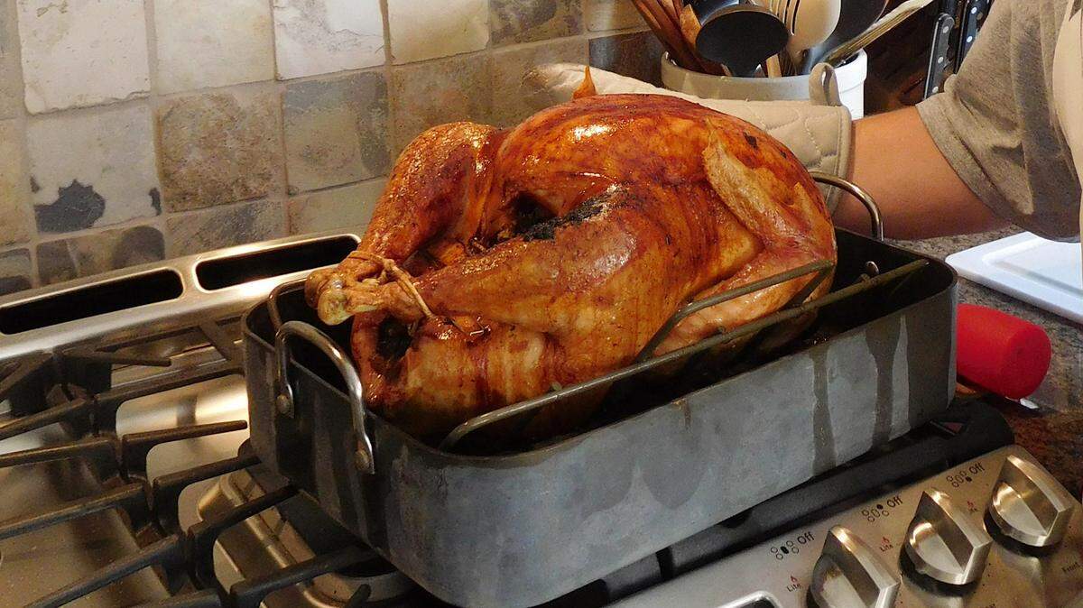 Cooking a turkey for your Thanksgiving meal? Experts suggest thawing the frozen bird in the refrigerator and using a food thermometer to ensure that it’s reached the correct temperature.