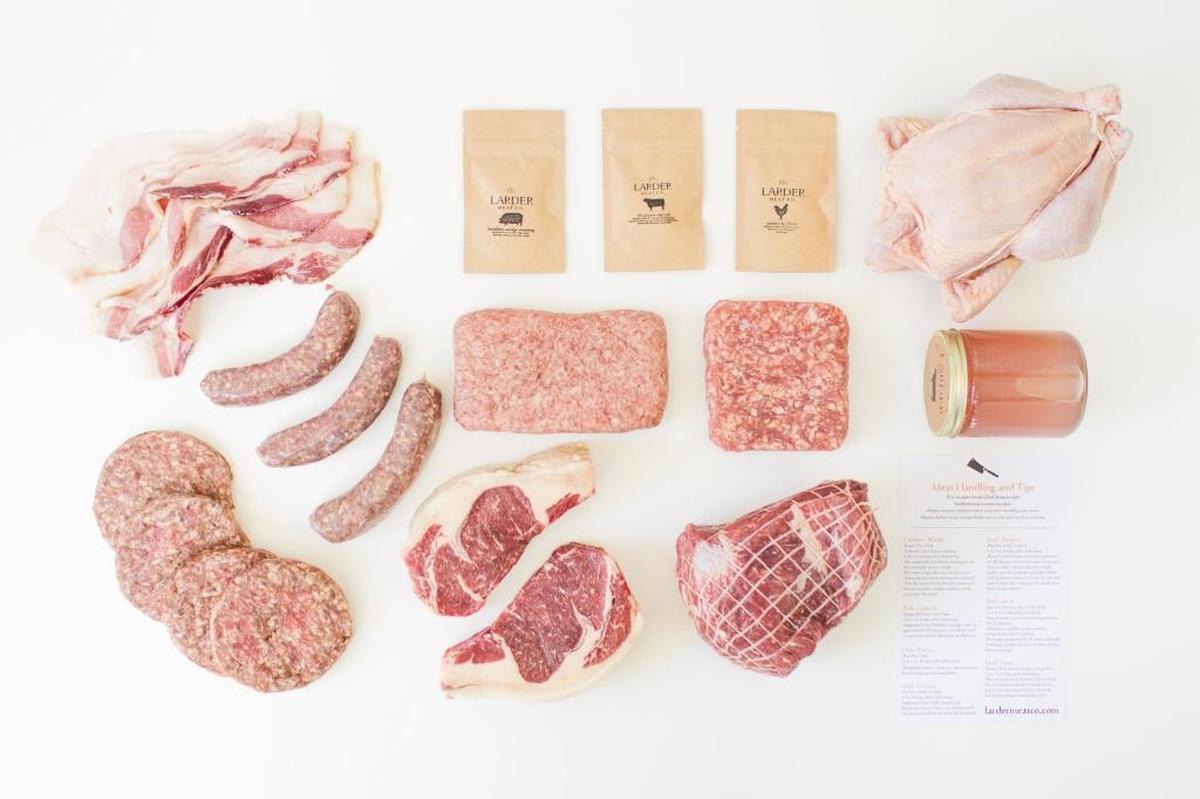 A large Larder Box from The Larder Meat Co. features beef steaks, a whole chicken, ground beef and ground pork, plus roasts and bacon. Mike Larson Courtesy of The Larder Meat Co.