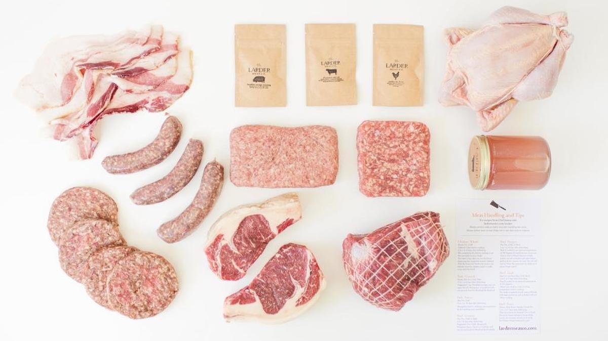 A large Larder Box from The Larder Meat Co. features beef steaks, a whole chicken, ground beef and ground pork, plus roasts and bacon.