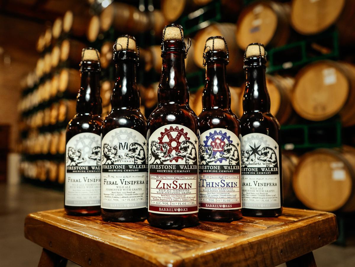 A selection of the finished versions of Barrelworks’ beer-wine hybrids, made at the Buellton-based branch of Firestone Walker Brewing Co., sit on a table.