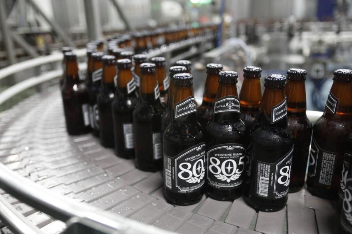 805 bottles move to cases on the bottling line at Firestone Walker Brewing Co. in Paso Robles.