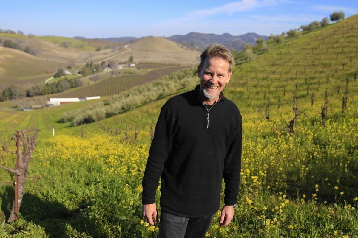 Kevin Jussila, winemaker and owner of Paso Robles winery kukkula, stands near his vineyard in 2017. Loyal customers continued to support the winery by shopping online during the coronavirus pandemic.