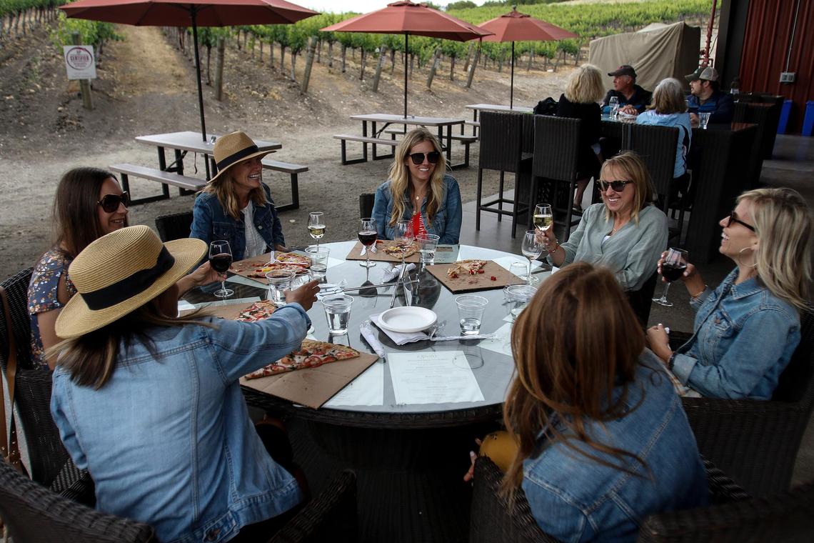 Opolo Vineyards in Paso Robles is returning to its food and wine service in their outdoor seating area with social distancing protocols in place. From left (in hat) Shelly Williams, Lauren Turek, Shannon Van Wagner, Jessica Easterly, Marzena Gilbert, Lindsay Wagner and Stephanie Combs.