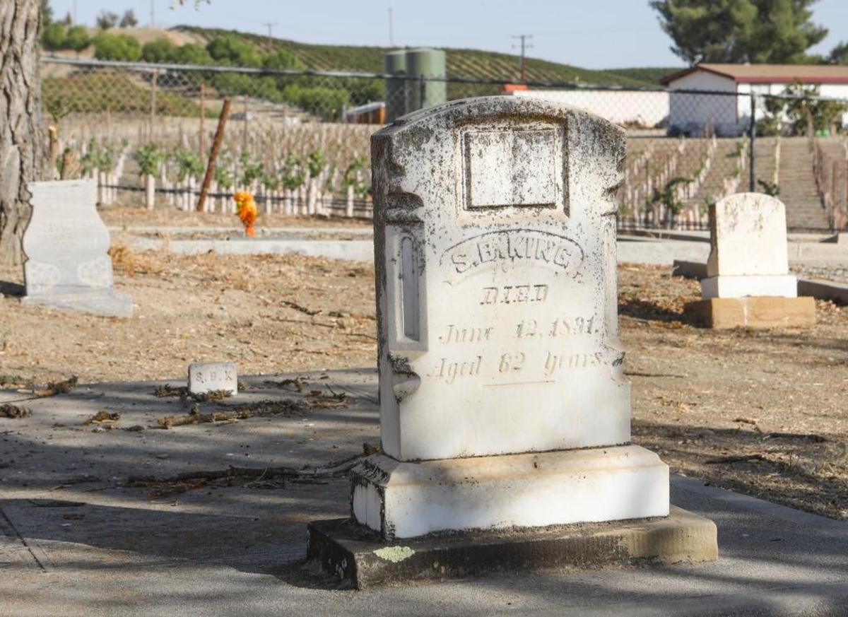A cemetery rests at the bottom of the hill where Graveyard Vineyards is located in San Miguel.