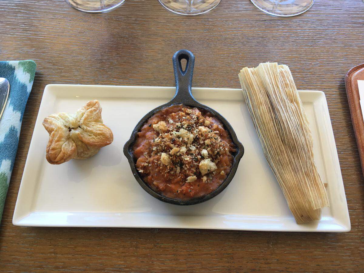 Pate en croute, duck cassoulet and a mushroom tamale are paired with pinot noir during a wine cave tour at Presqu’ile Winery in Santa Maria.