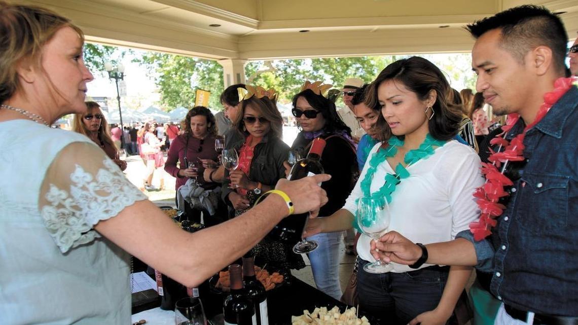 Paso Robles wineries join together to showcase their wines during the Paso Robles Wine Festival’s Grand Tasting in the city’s downtown park in 2015.