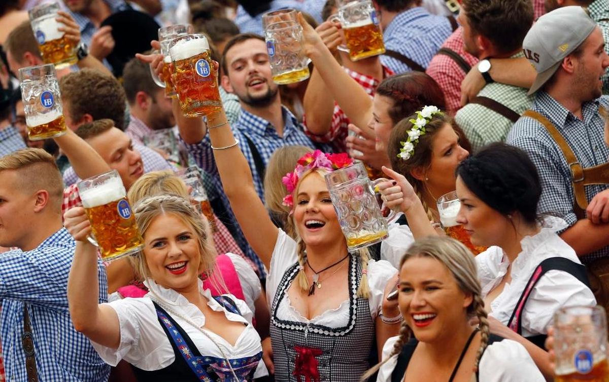 People celebrate the opening of the Oktoberfest beer festival in Munich in southern Germany. Several Oktoberfest celebrations are planned on the Central Coast, including Templeton Oktoberfest on Sept. 30 at Templeton Park.