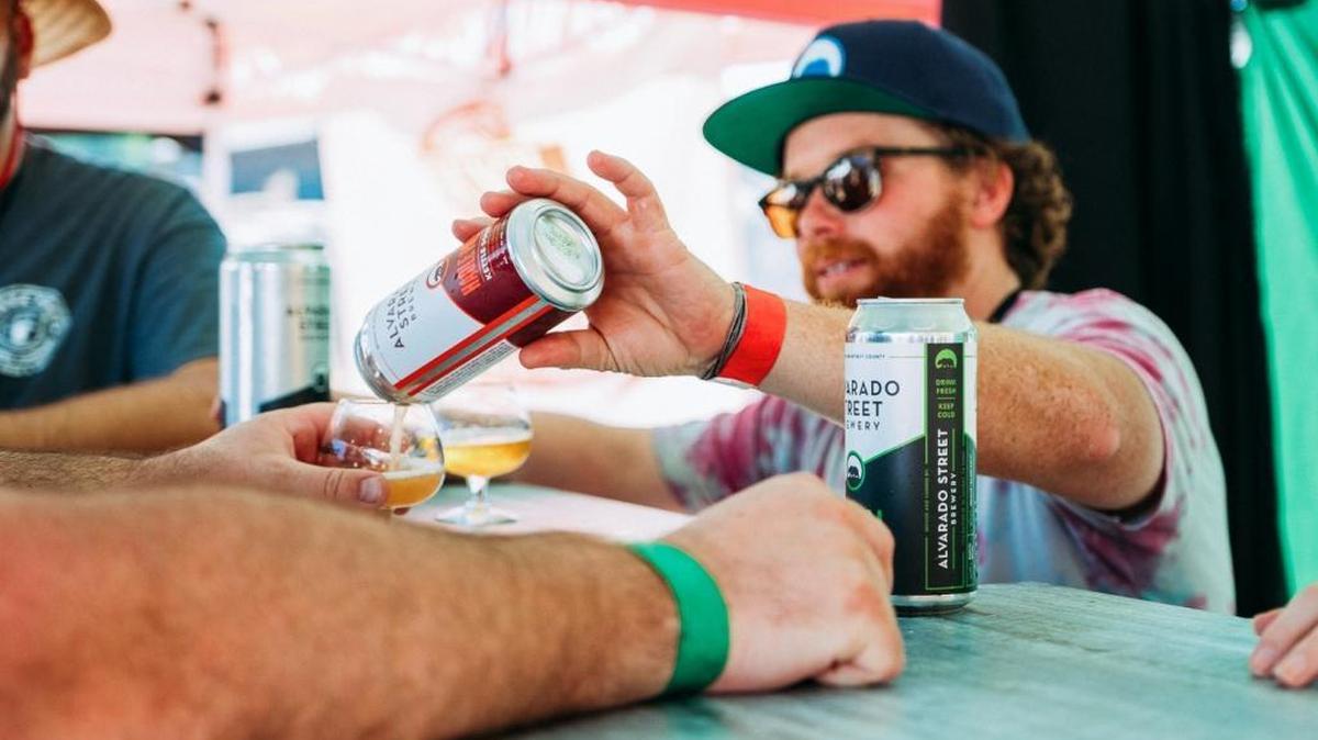 A pourer with Alvarado Street Brewery in Monterey pours a glass of beer at Central Coast Sourfest in 2016. The festival returns to BarrelHouse Brewing Co. in Paso Robles on Sept. 23.
