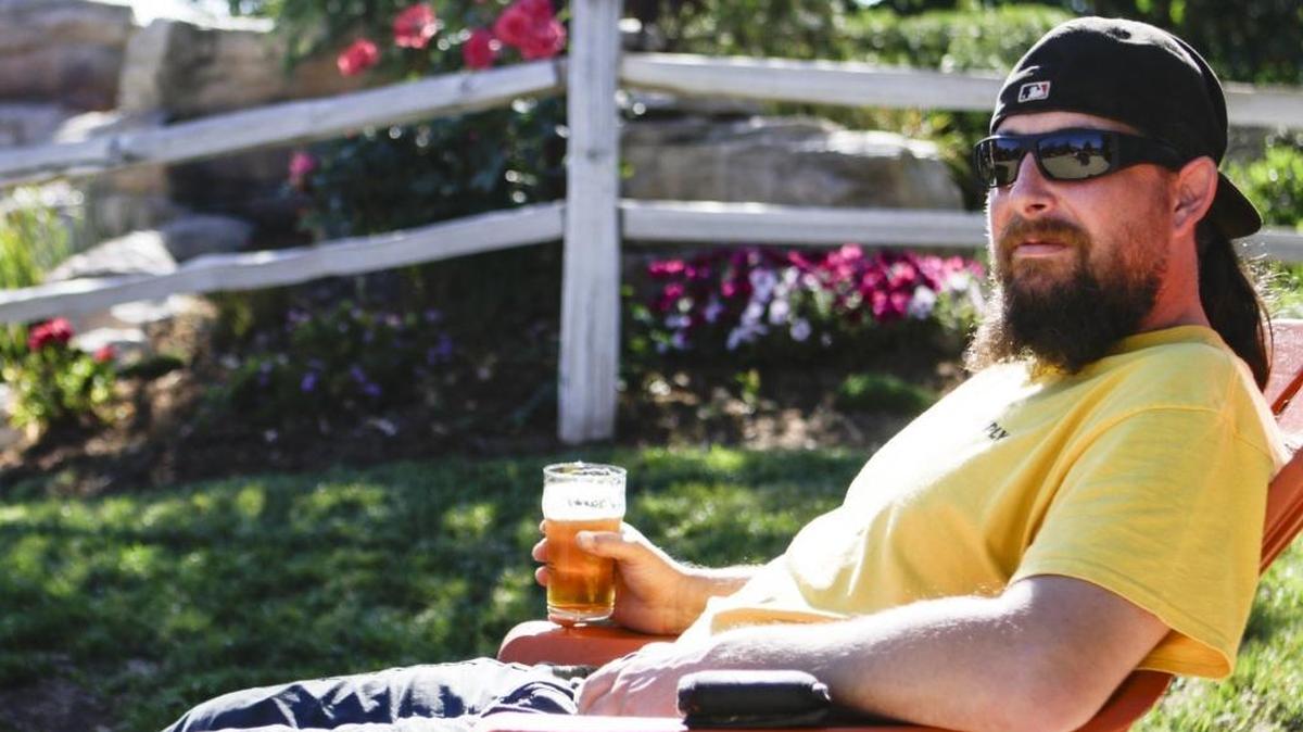 Charlie Boriack has a beer in the garden next to Barrelhouse Brewing Co. in Paso Robles in 2018. Wineries, breweries and distilleries that don’t serve food can open outdoors under new COVID-19 safety guidelines.