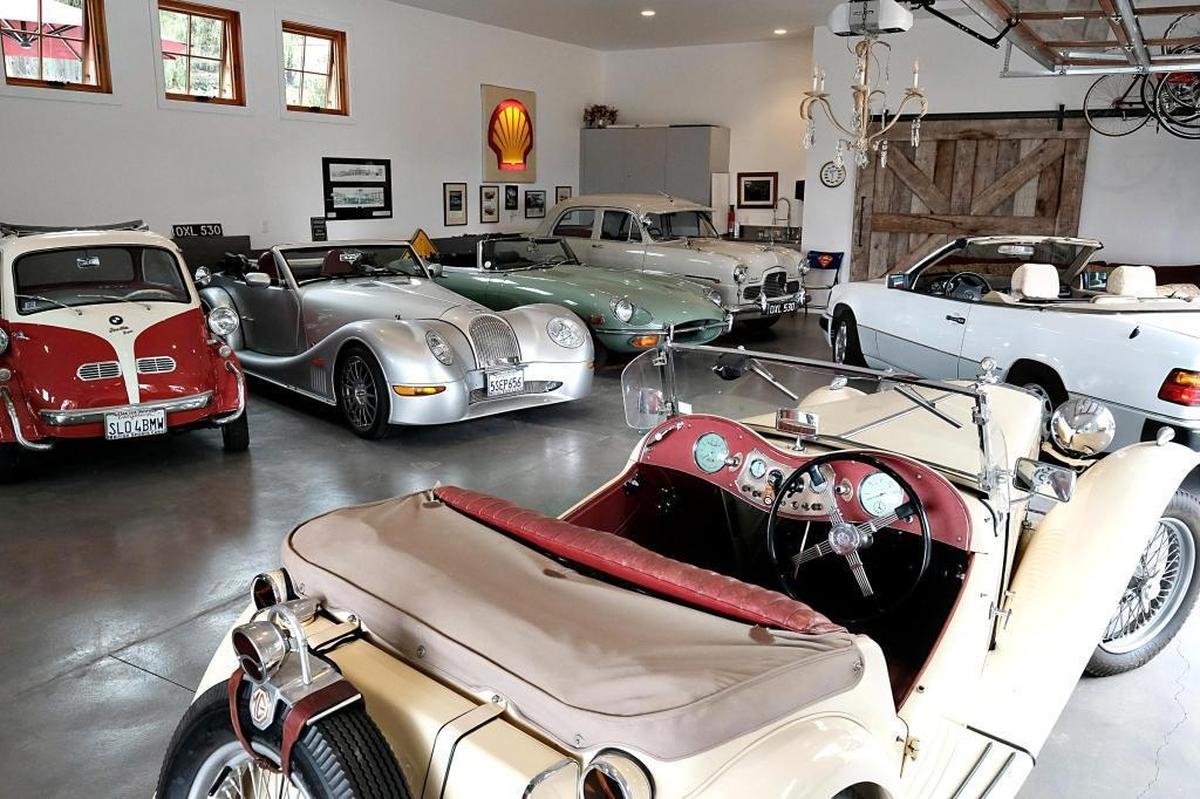 The Walkers remodeled their house to make more space for a large garage to house David Walker’s car collection.