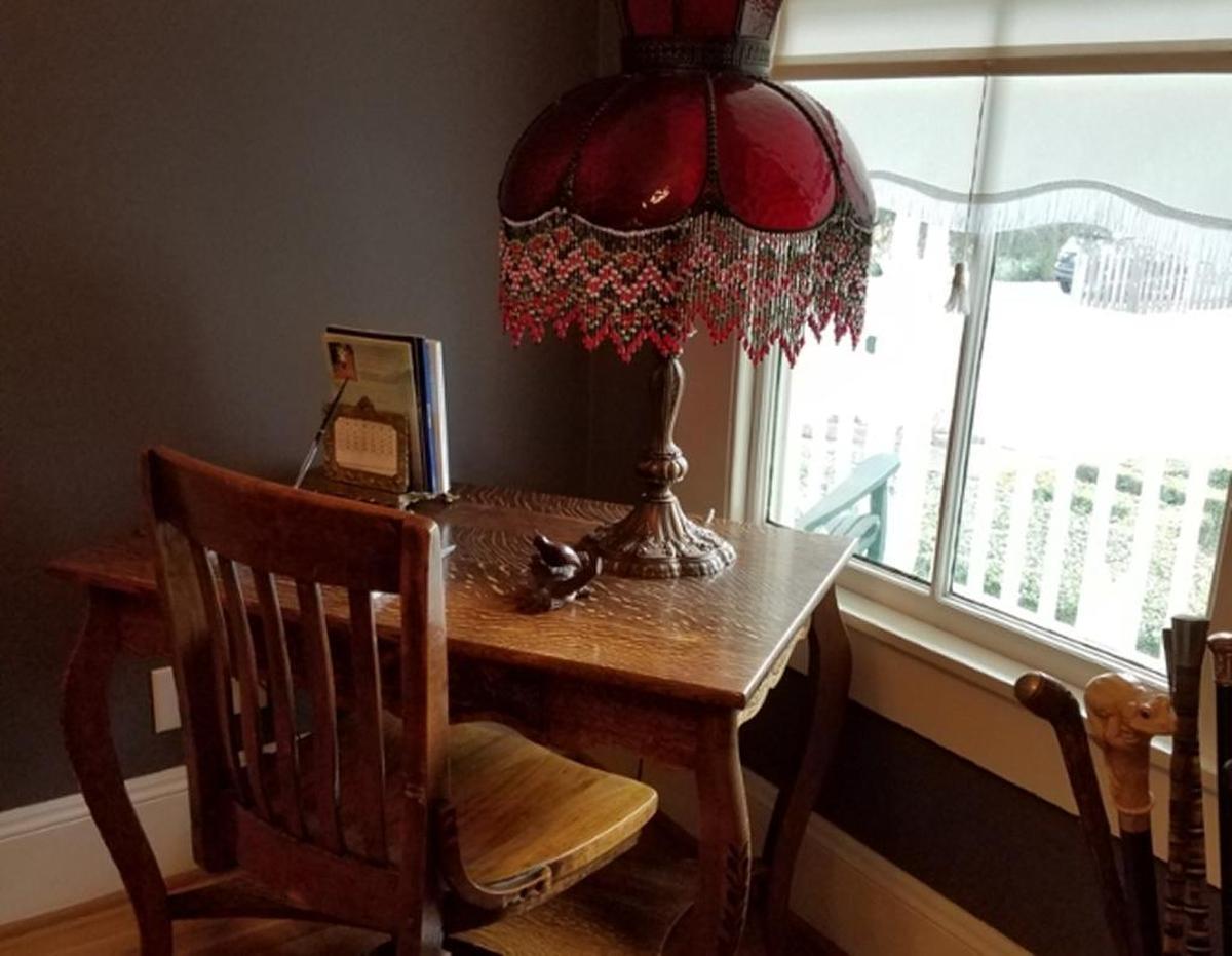 This desk, brought to California during the Great Depression by Ruth Maples’ grandmother, is one of her favorite pieces in her Cambria home.
