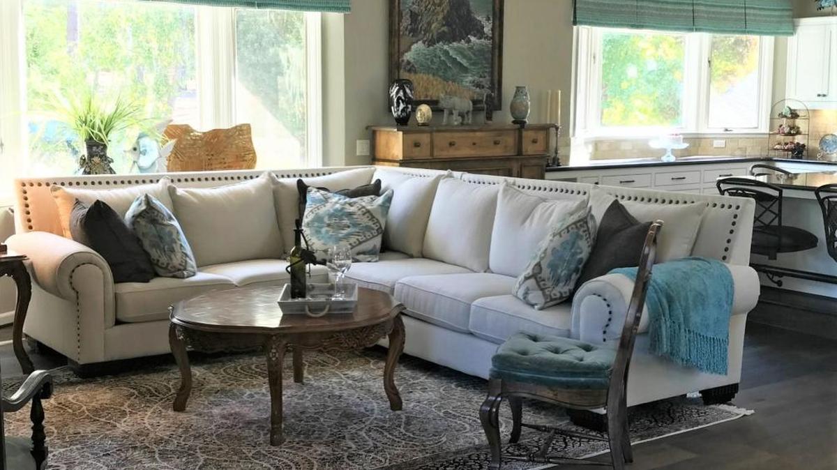 The living room combines Old World elements with clean-lined contemporary design at the Clark home in Cambria.