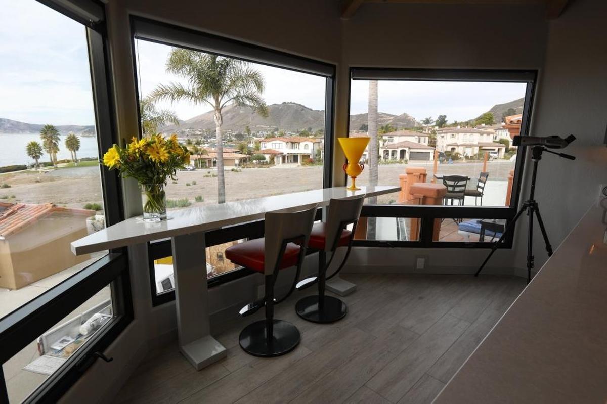 Several rooms of the Sardellas’ Shell Beach home have ocean views, including this breakfast area off the kitchen.