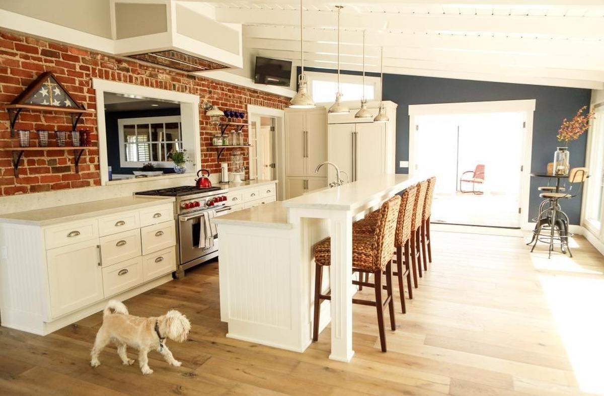The newly remodeled kitchen and dining areas are light and bright.