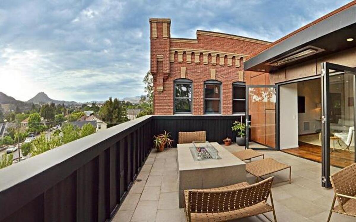 The Borreros' large patio looks out on city and mountain views.