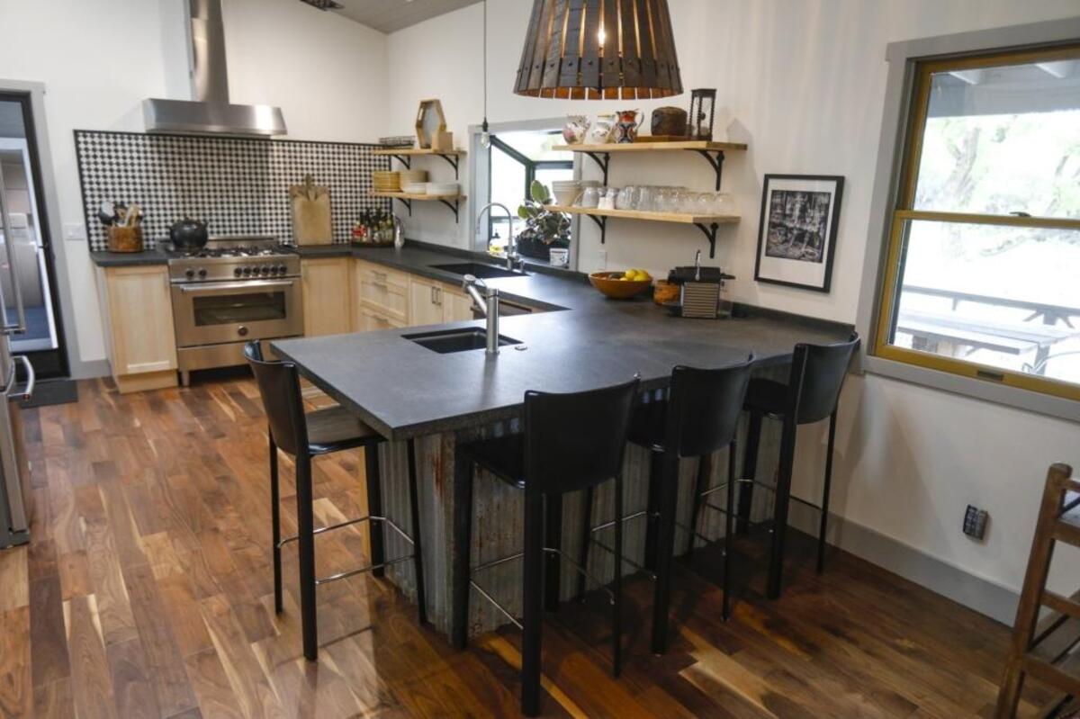 Michael Bonner and Lizz Kluger installed open shelving in the kitchen of their Paso Robles ranch home to make the most of the small space.