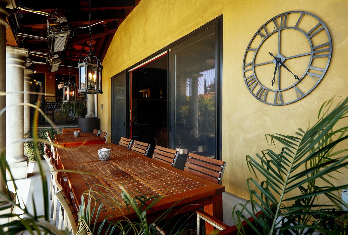 The patio at Rushdi and Nisha Abdul Cader's San Luis Obispo home has enough space for 14 people to dine comfortably.