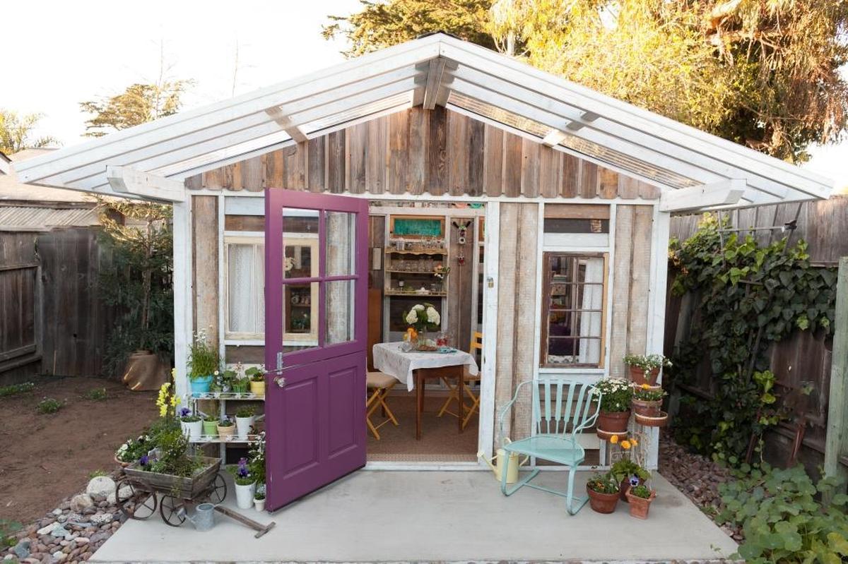Kathleen Spencer used her she-shed to display collections of handmade dolls and antique glass.