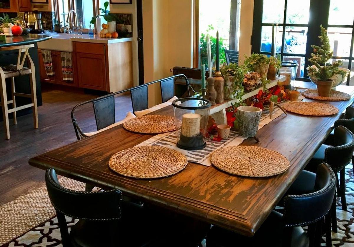 A rustic farmhouse table is among the western touches in Jodi and Gordon Swanson’s Cambria home.