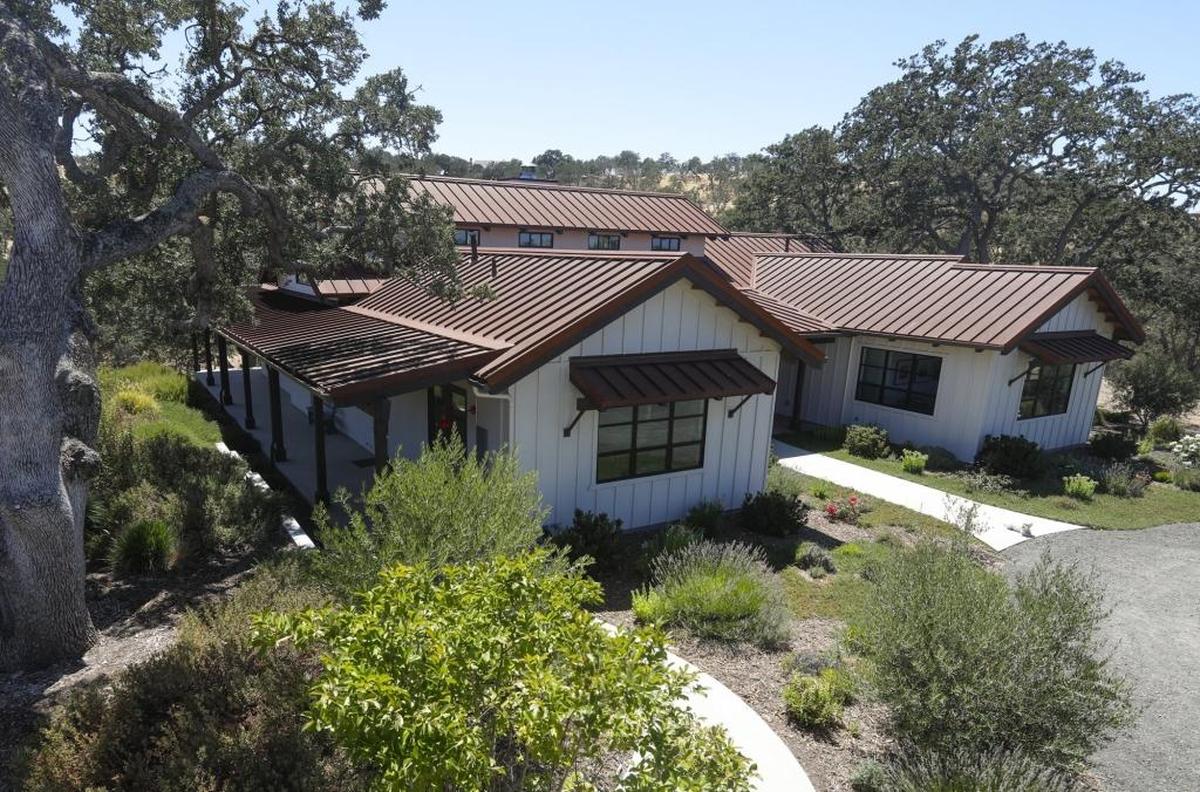 The H-shaped design of this Templeton home allows many rooms to have windows on three sides.