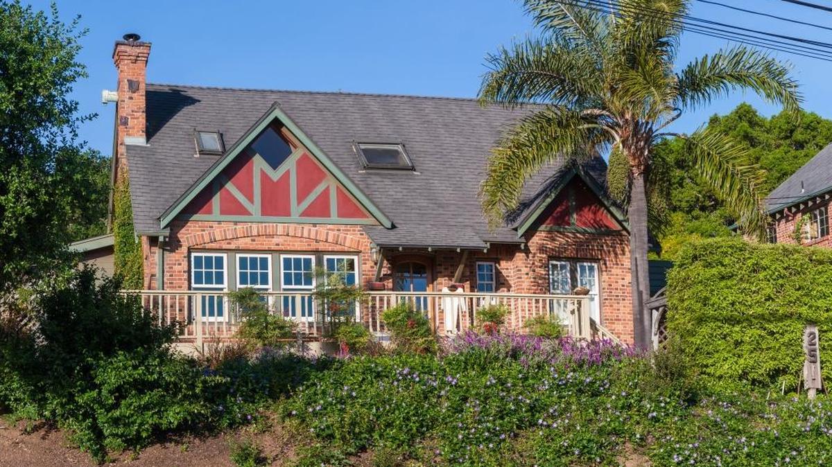 Known as the Cook house, the Candaele family’s 1926 English Tudor home in San Luis Obispo was built from locally made brick. A remodel in 2001 included installation of new, energy-efficient windows.
