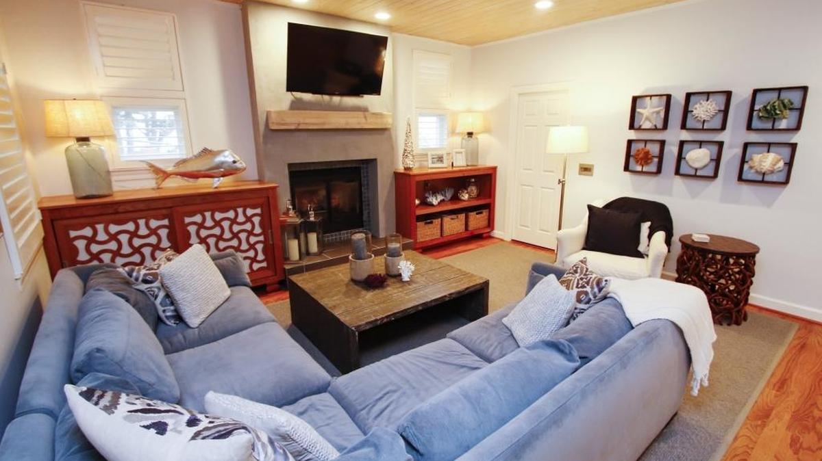 A sectional creates ample seating around the television in the living room of Michelle and Jim Orradre’s home in San Luis Obispo.