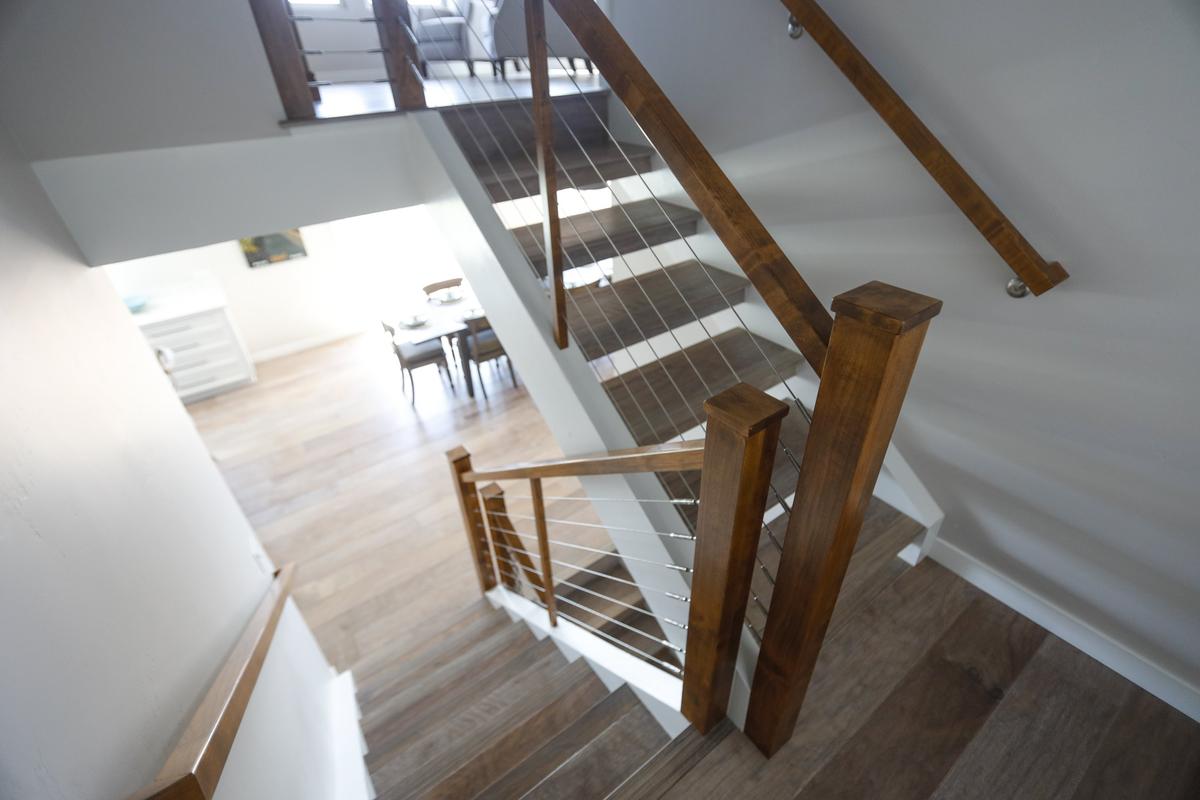 John and Diane Somers chose a modern stairway to replace carpeted stairs in their Cambria home.