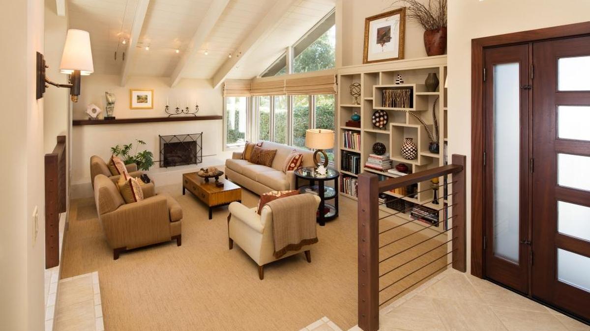 The main living area now has an opened up, tongue-and-groove ceiling and larger windows, which gave the couple views of Cerro San Luis.