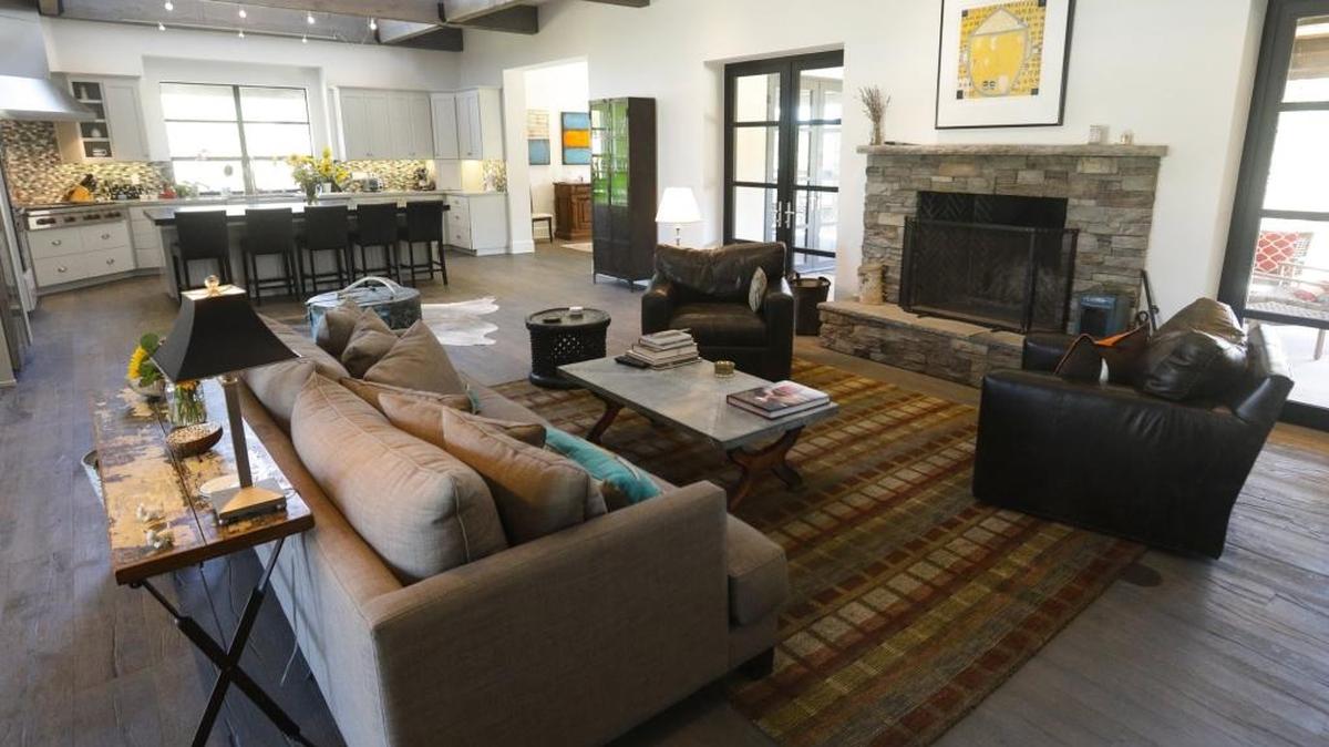 Doug Kilgour and Anne Hilbert’s modern farmhouse in Templeton features a great room that flows to the kitchen, with double doors leading to an outside patio.