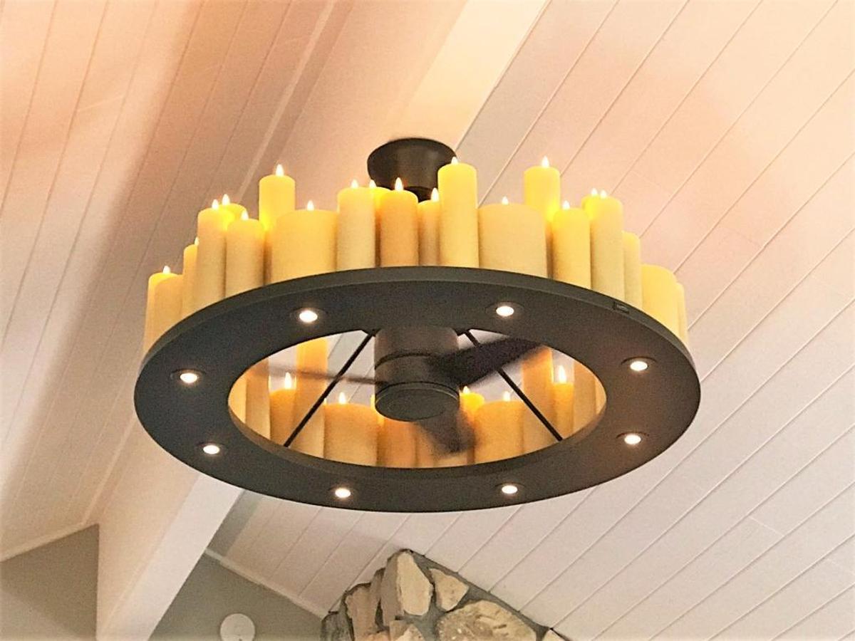 New light fixtures include this chandelier with LED candles at the Clark home in Cambria.